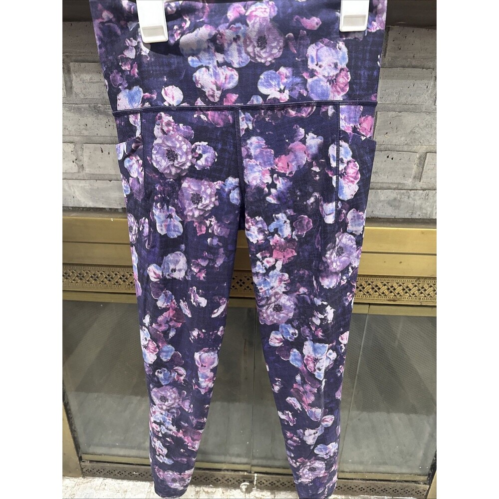 Women’s Athleta Leggings Size Small. Purple Floral In Color. Pockets